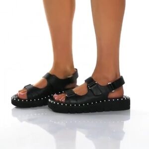 Stuart Weitzman Zoe Lift Sandal in Black